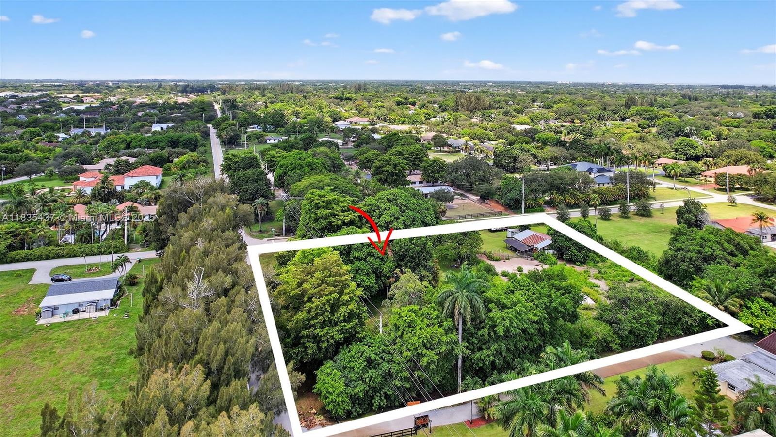 13851 Southwest 26th Street Davie, FL 33325 - Photo 41 of 48 an aerial view of residential houses with outdoor space and street view