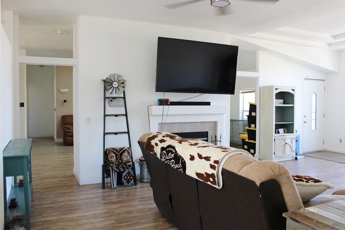 10158 Hillview Acres Road Weldon, CA 93283 - Photo 7 of 45 a living room with furniture and a flat screen tv
