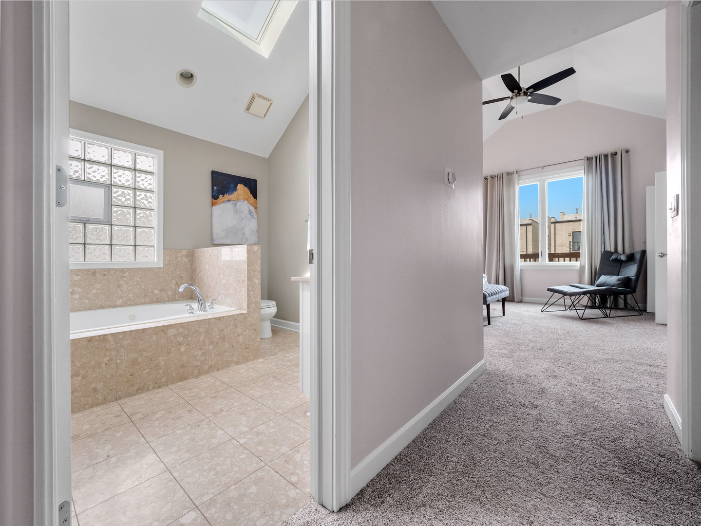 2452 West Dakin Street Chicago, IL 60618 - Photo 25 of 39 a view of a livingroom with a tub and windows