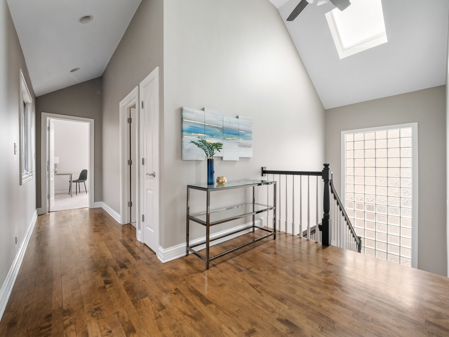 2452 West Dakin Street Chicago, IL 60618 - Photo 28 of 39 a view of a hallway with wooden floor and windows