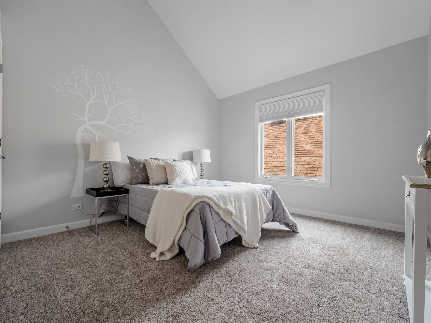 2452 West Dakin Street Chicago, IL 60618 - Photo 29 of 39 a spacious bedroom with a bed and window