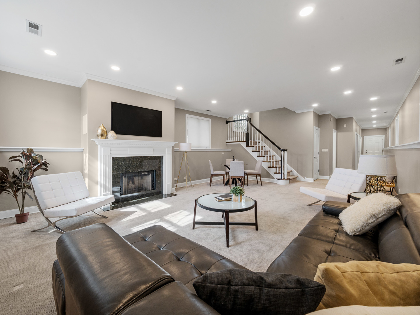 2452 West Dakin Street Chicago, IL 60618 - Photo 7 of 39 a living room with furniture and a fireplace