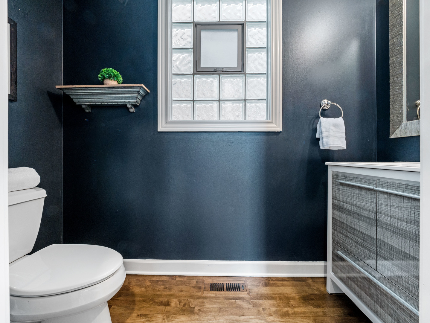 2452 West Dakin Street Chicago, IL 60618 - Photo 10 of 39 a bathroom with a toilet and a shower
