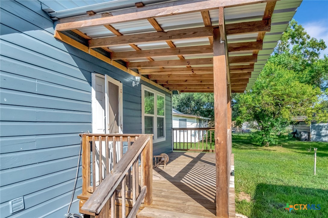 1303 East North Street Victoria, TX 77901 - Photo 29 of 36 a balcony view with a backyard space