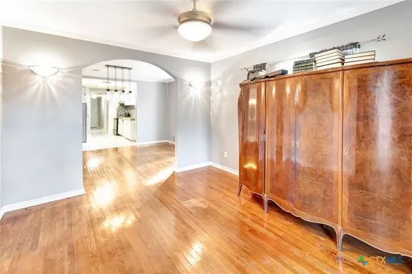 a view of a hallway with a chandelier