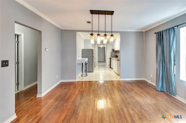 a view of a livingroom with a chandelier