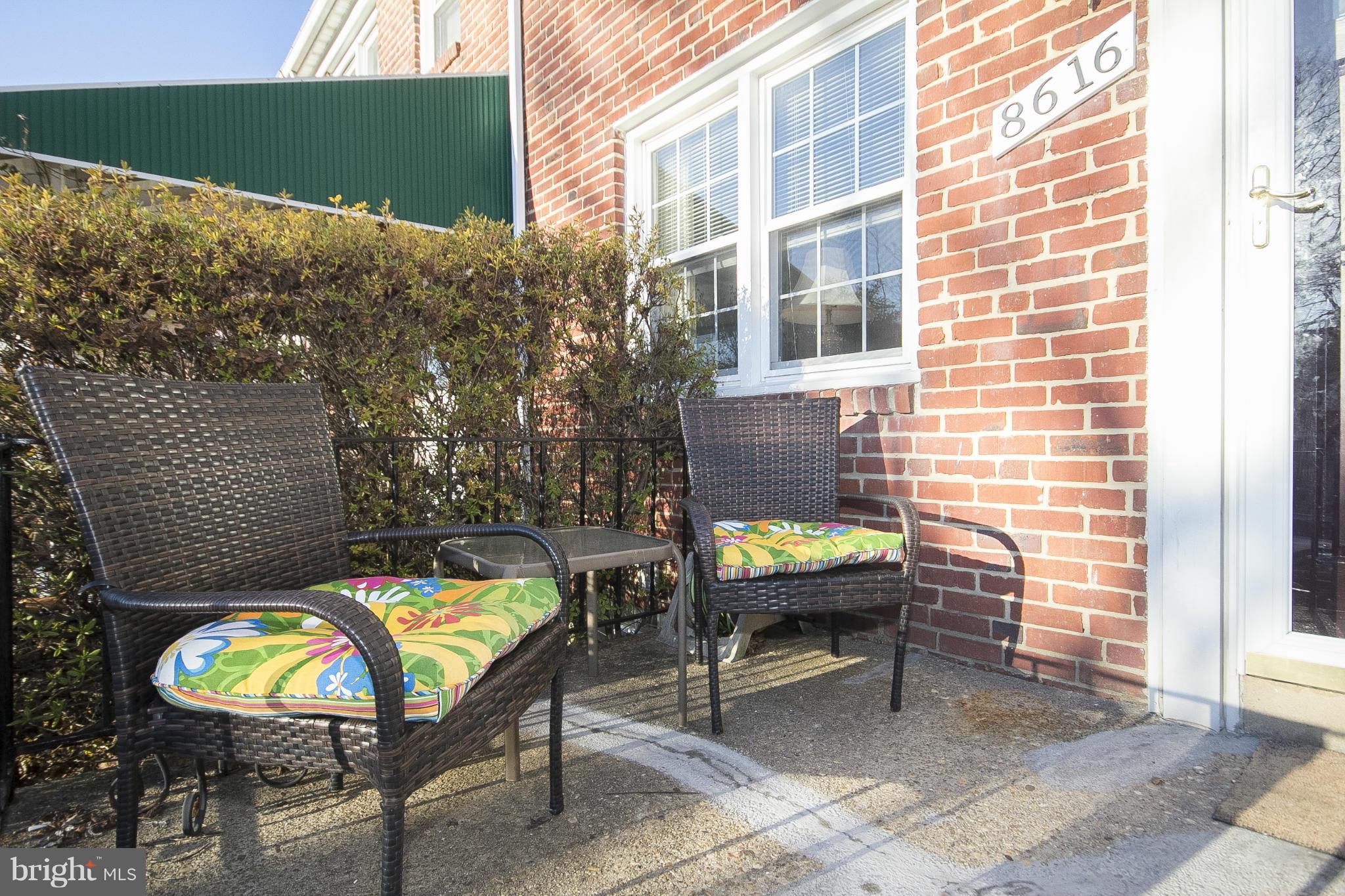 8616 Black Oak Road Baltimore, MD 21234 - Photo 2 of 21 a view of a chairs and table in patio