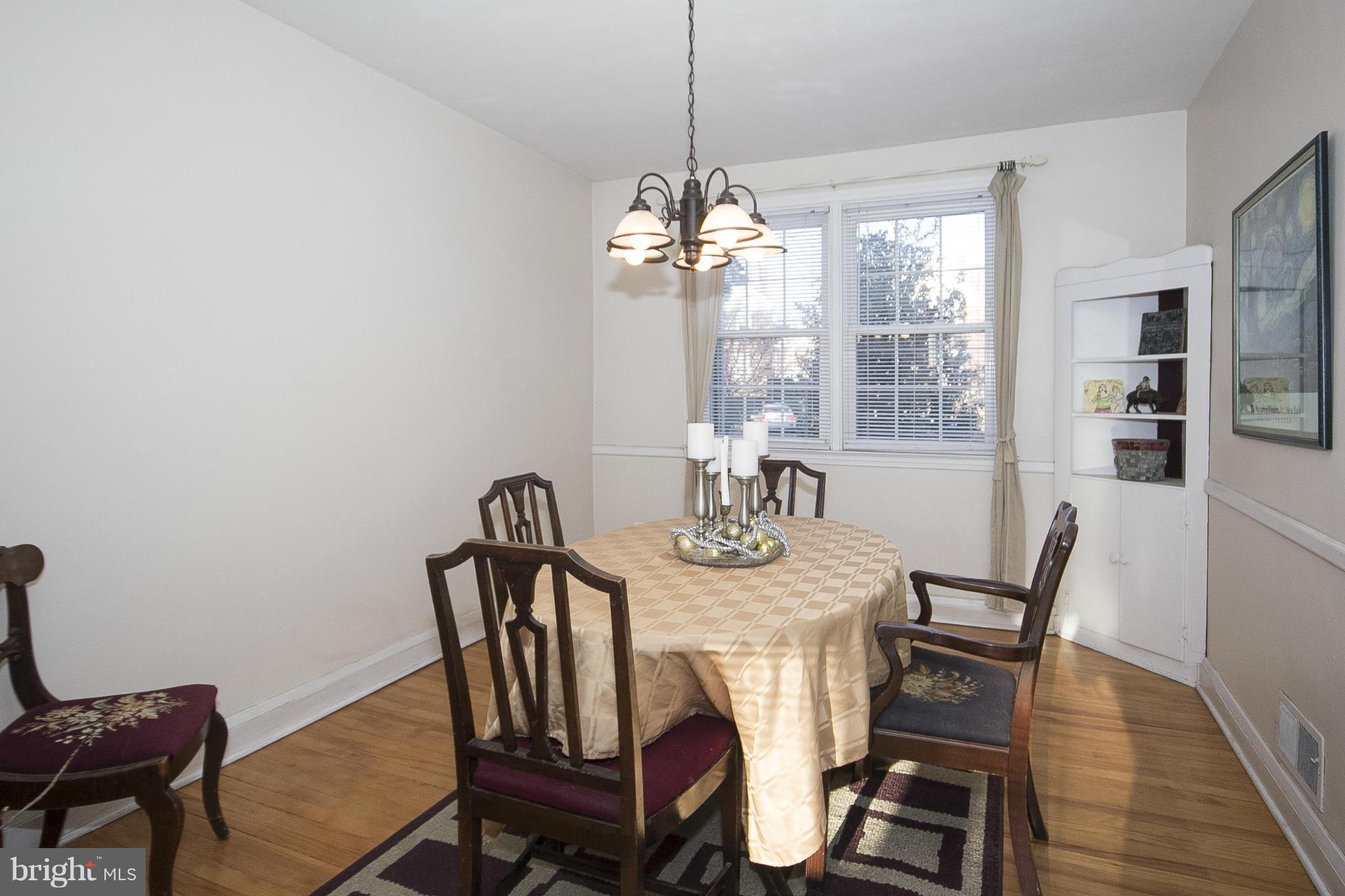8616 Black Oak Road Baltimore, MD 21234 - Photo 5 of 21 a view of a dining room with furniture window and outside view