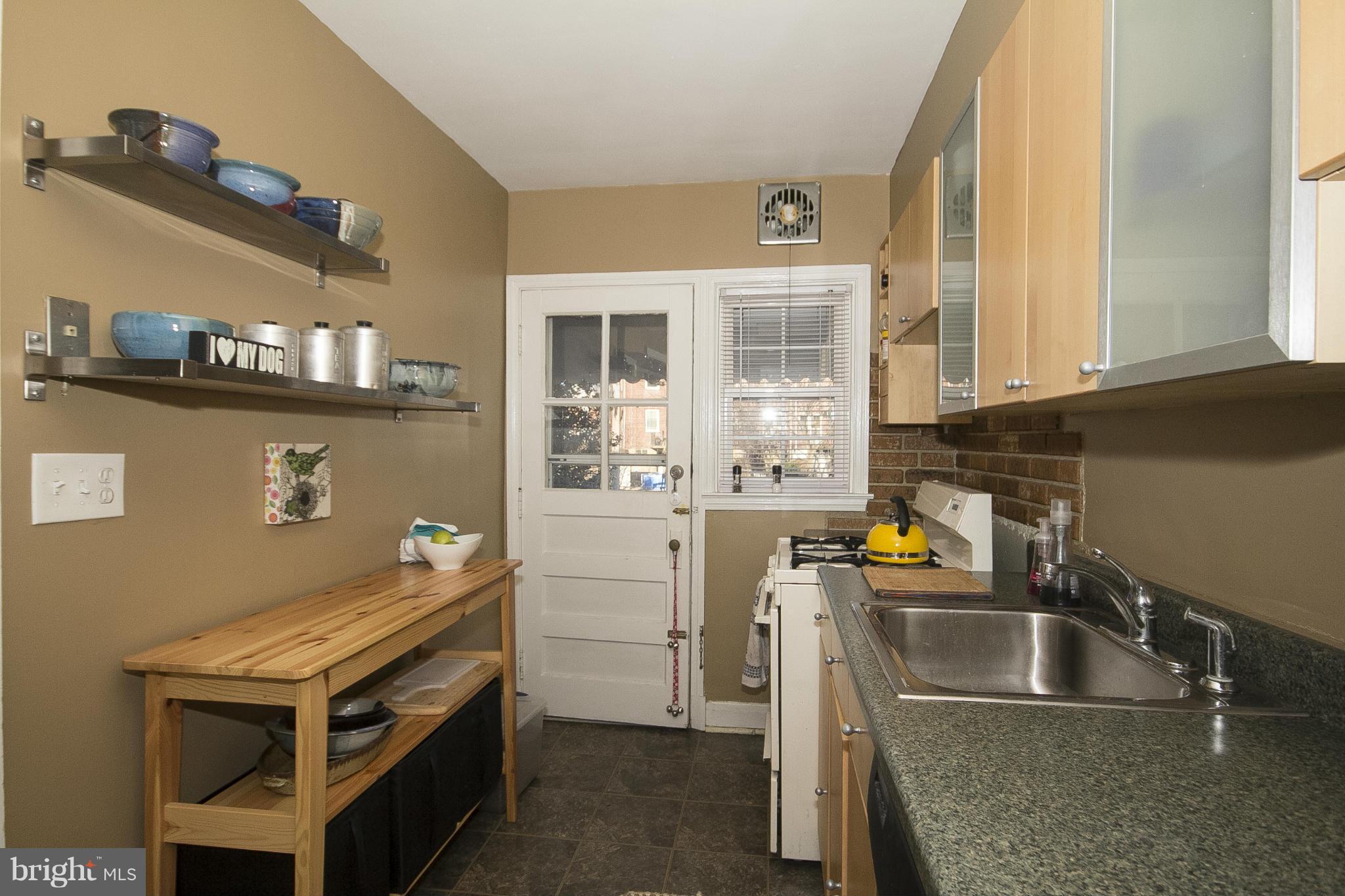 8616 Black Oak Road Baltimore, MD 21234 - Photo 6 of 21 a kitchen with a stove and a sink