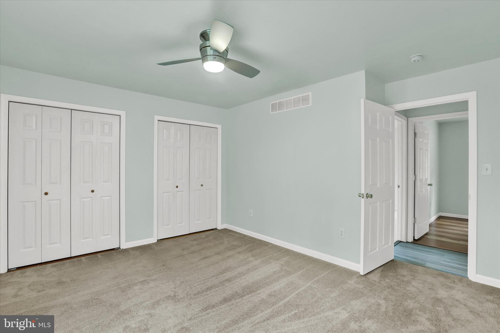 77 Hockamick Road Cookstown, NJ 08511 - Photo 11 of 25 a view of an empty room with a chandelier fan