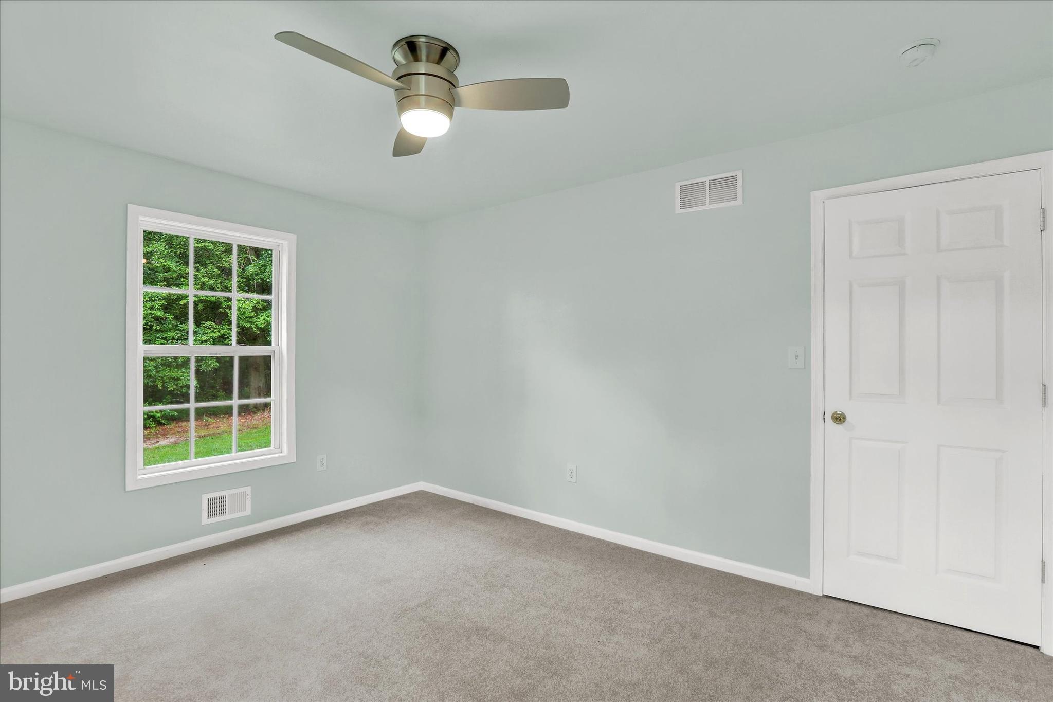 77 Hockamick Road Cookstown, NJ 08511 - Photo 18 of 25 an empty room with a window