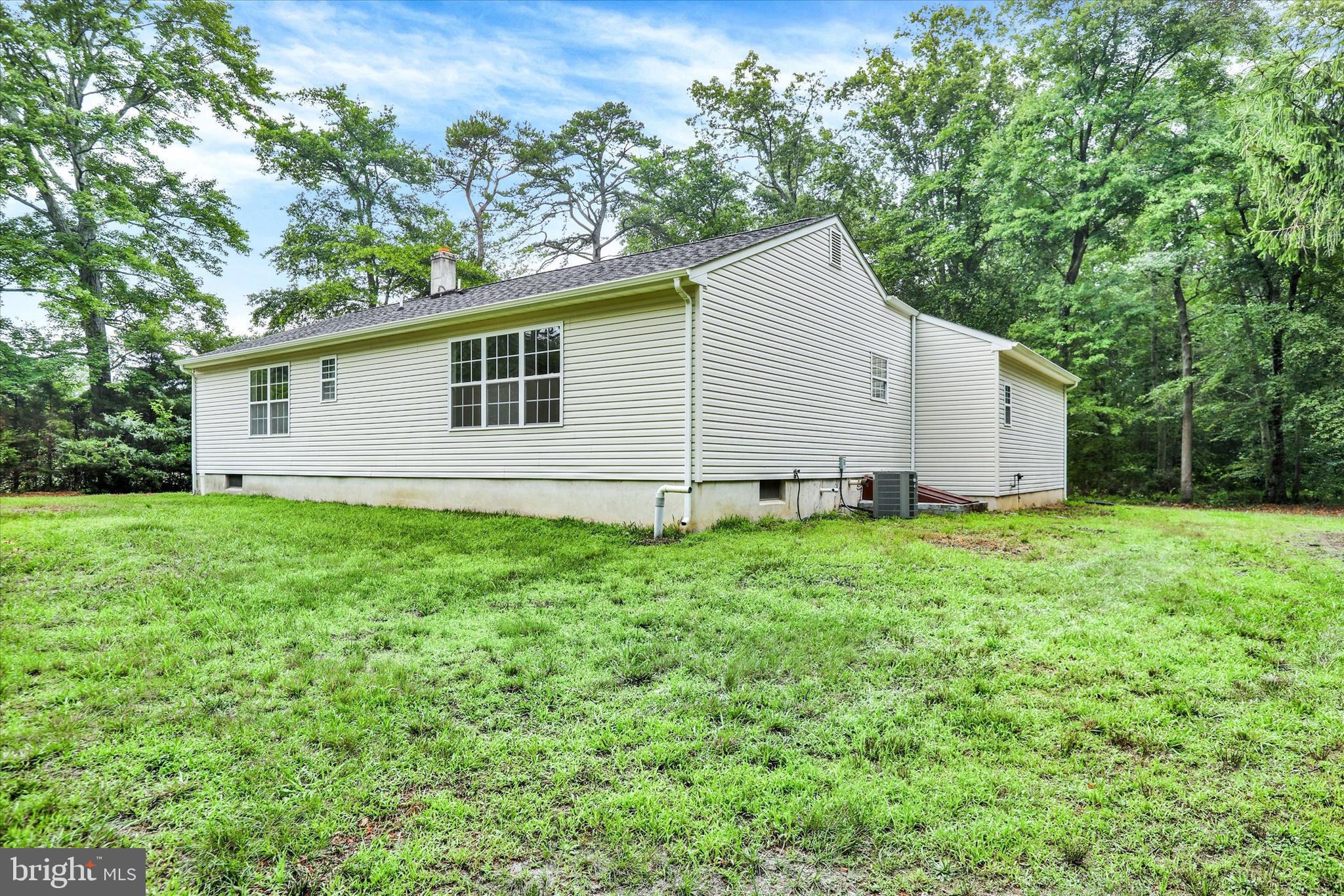 77 Hockamick Road Cookstown, NJ 08511 - Photo 24 of 25 a view of a house with backyard