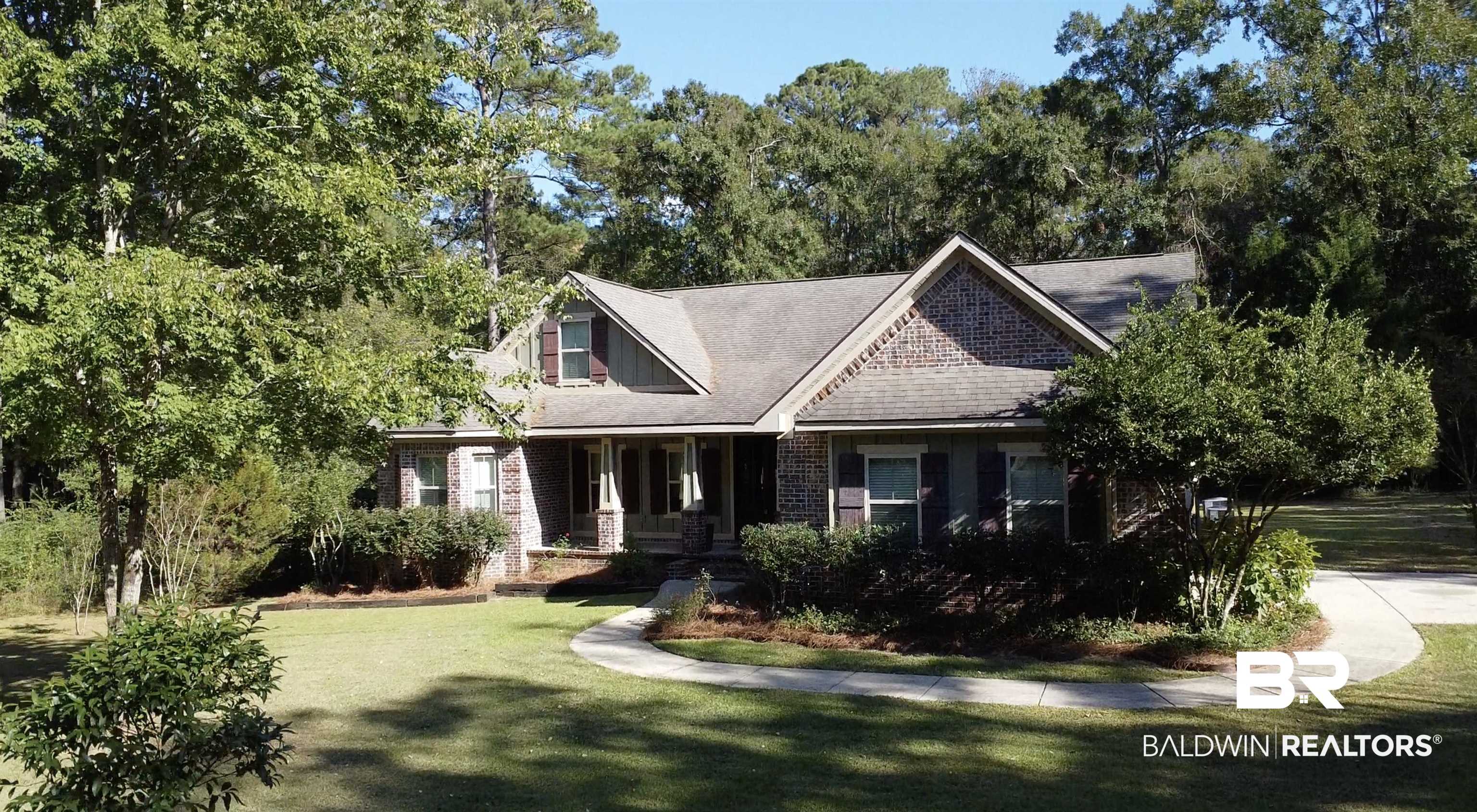 10846 County Road 138 Bay Minette, AL 36507 - Photo 29 of 53 Craftsman house with a front yard and covered porch