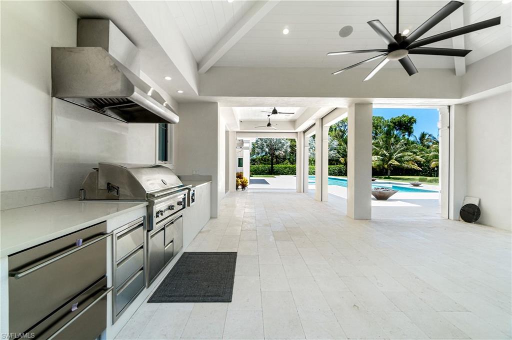 171 North Street Naples, FL 34108 - Photo 35 of 50 View of swimming pool featuring a patio