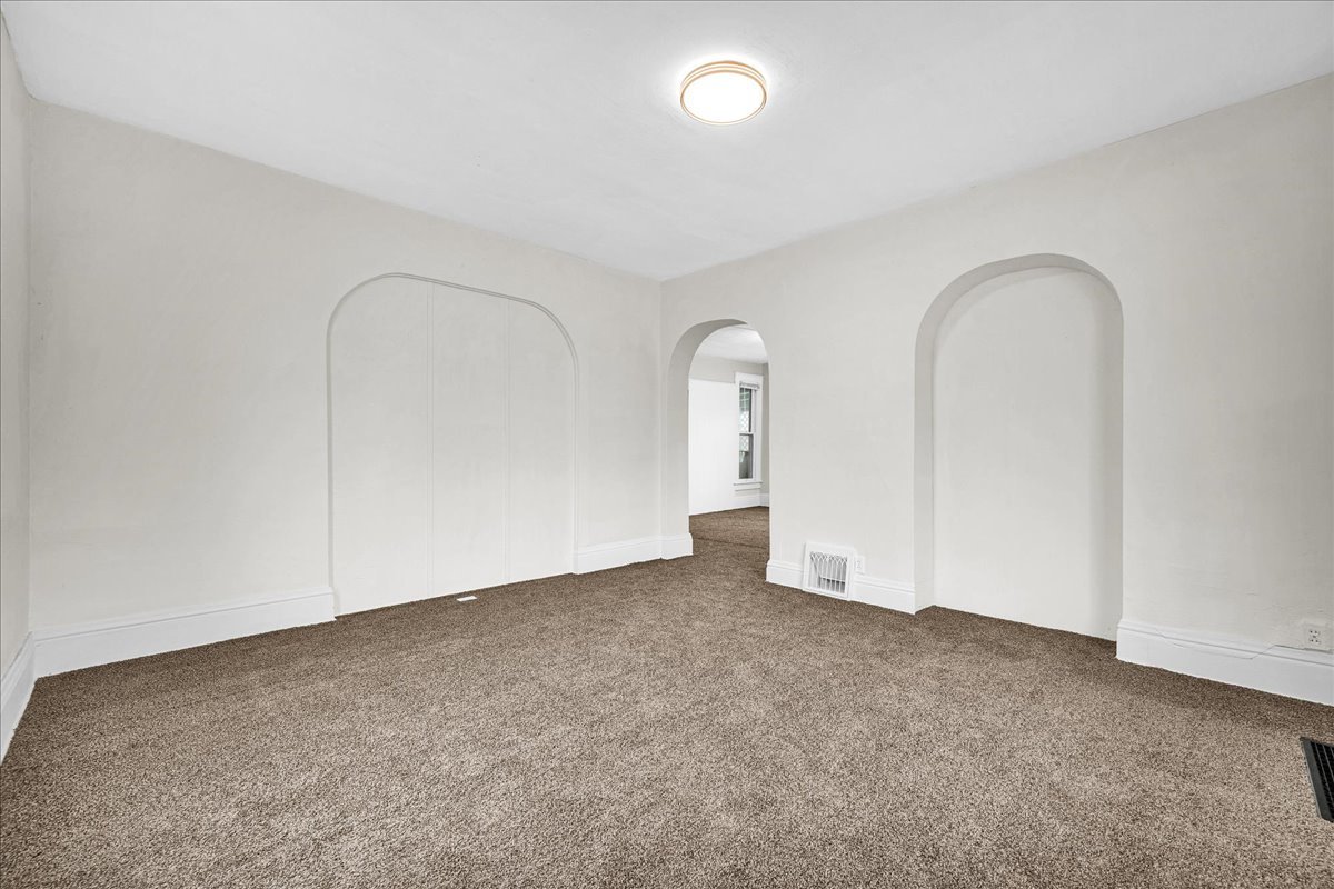 449 North 3rd Avenue Canton, IL 61520 - Photo 11 of 28 an empty room with a door