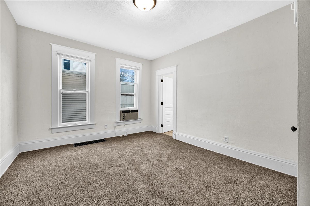 449 North 3rd Avenue Canton, IL 61520 - Photo 12 of 28 a view of an empty room with a window