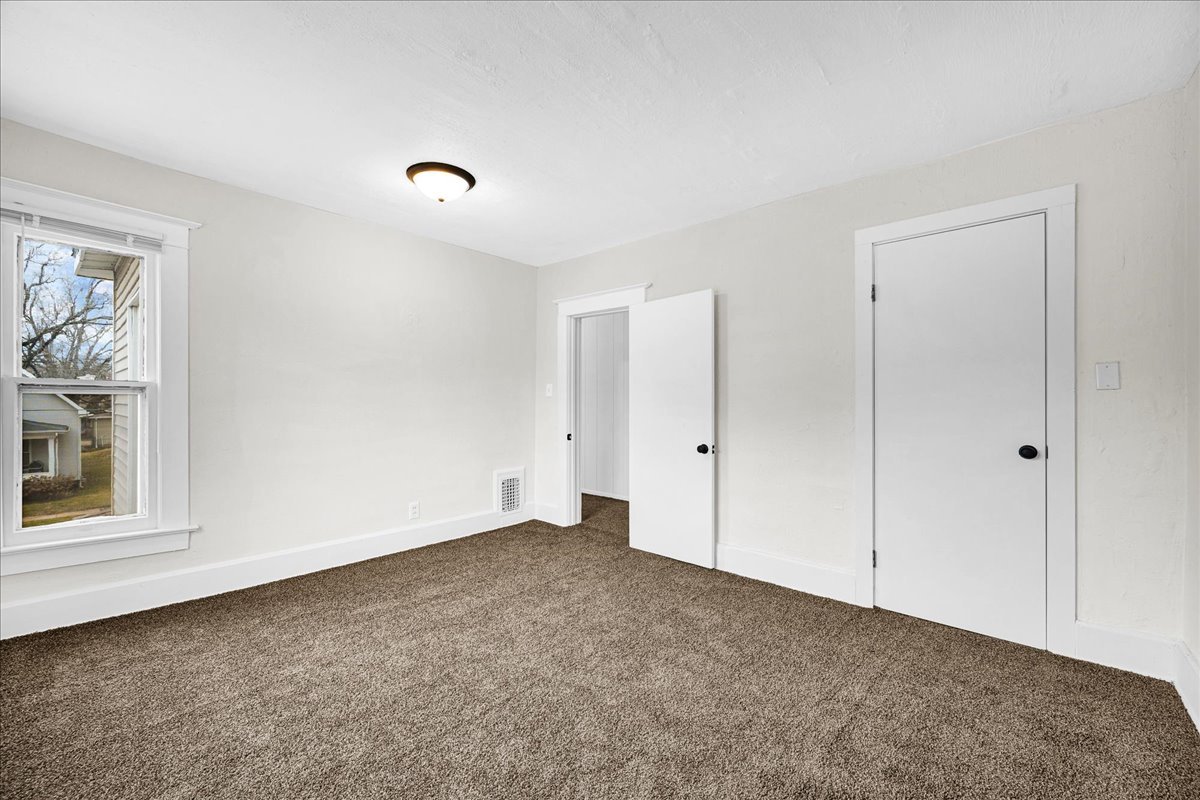 449 North 3rd Avenue Canton, IL 61520 - Photo 22 of 28 a view of an empty room with a window