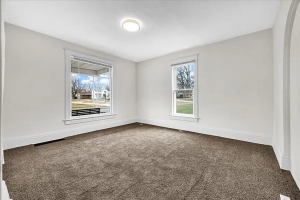 an empty room with windows