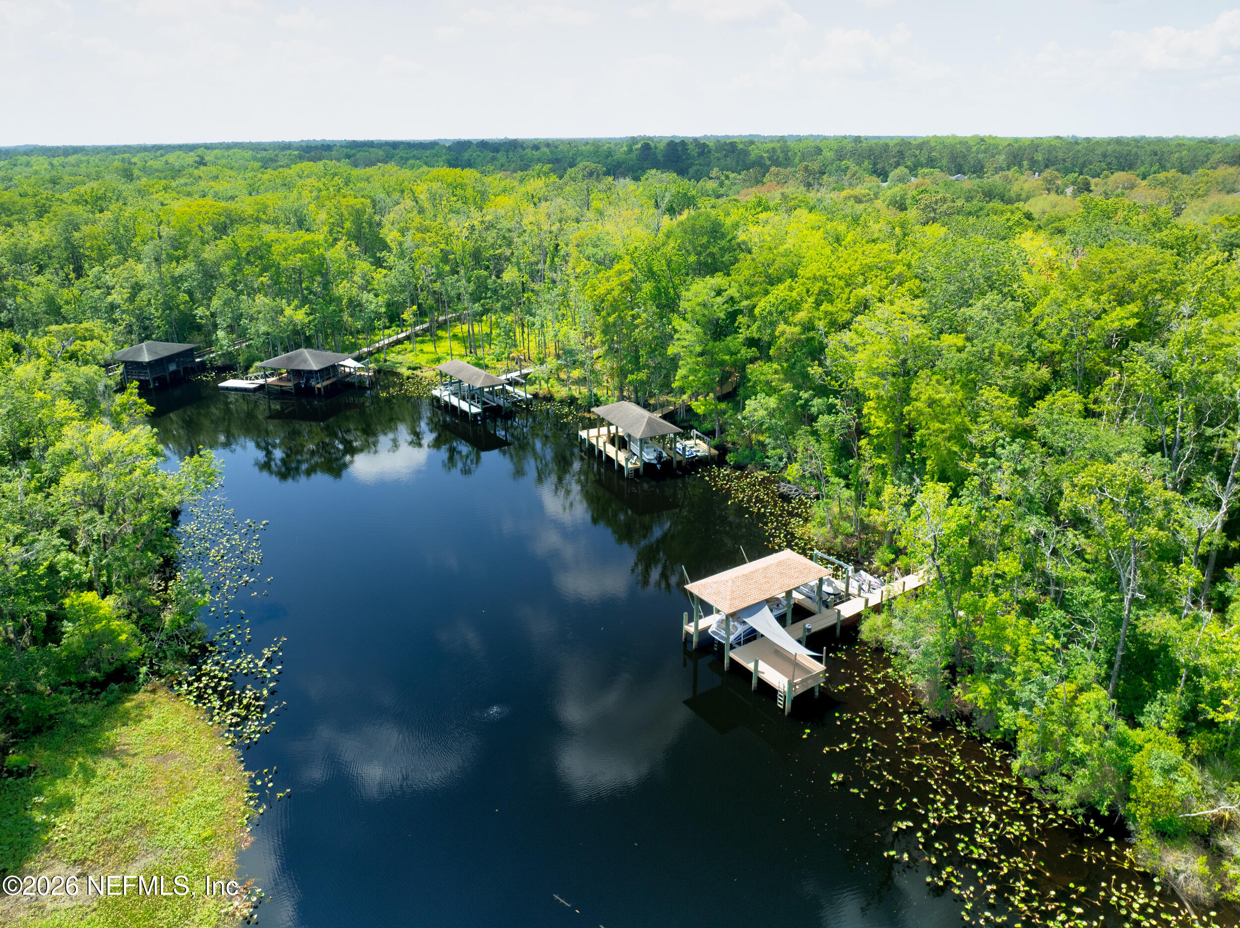 3225 Bishop Estates Road St. Johns, FL 32259 - Photo 66 of 90 a view of a lake with outdoor space