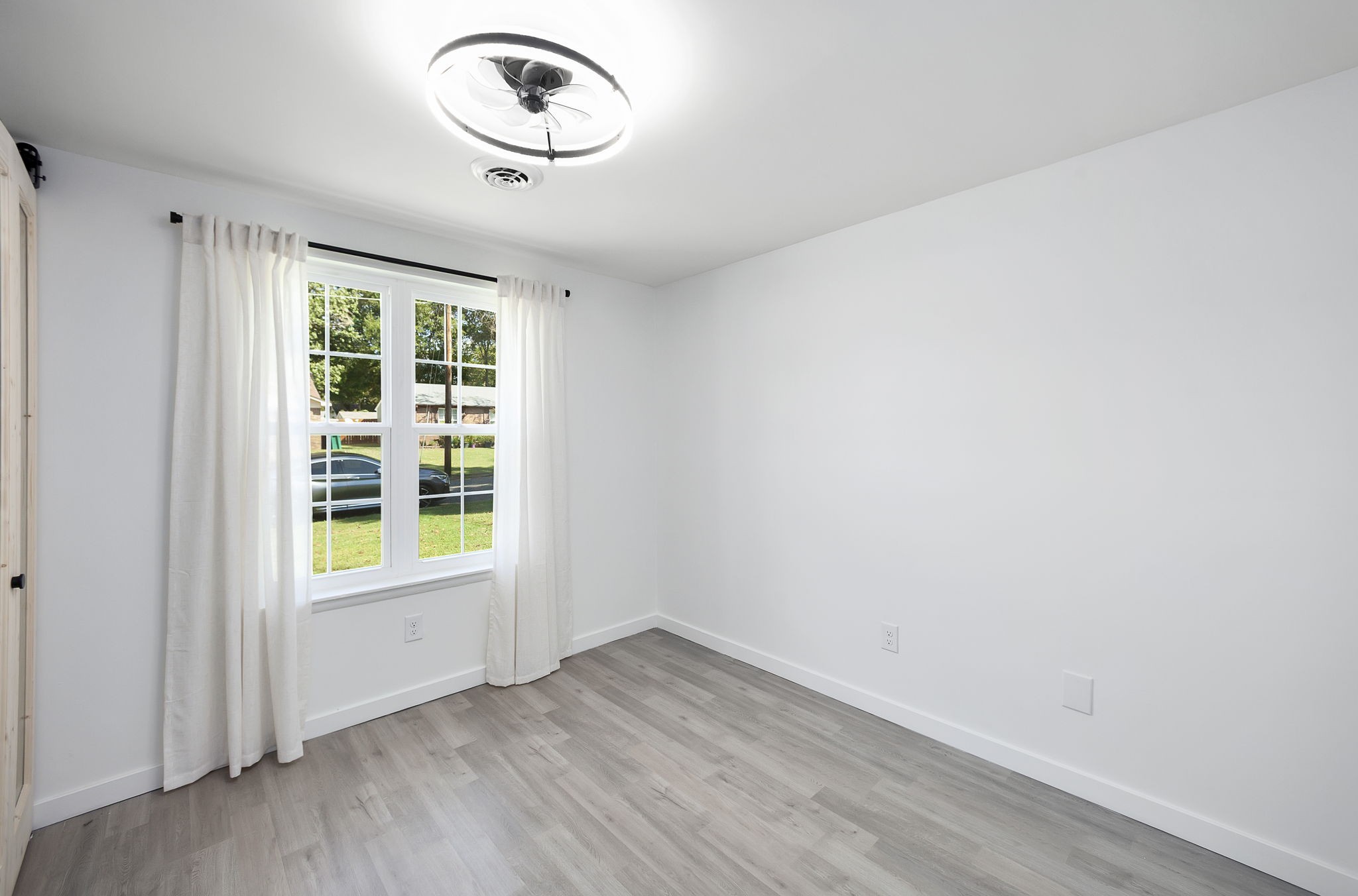 5 Raintree Cove Jackson, TN 38305 - Photo 11 of 25 an empty room with a window