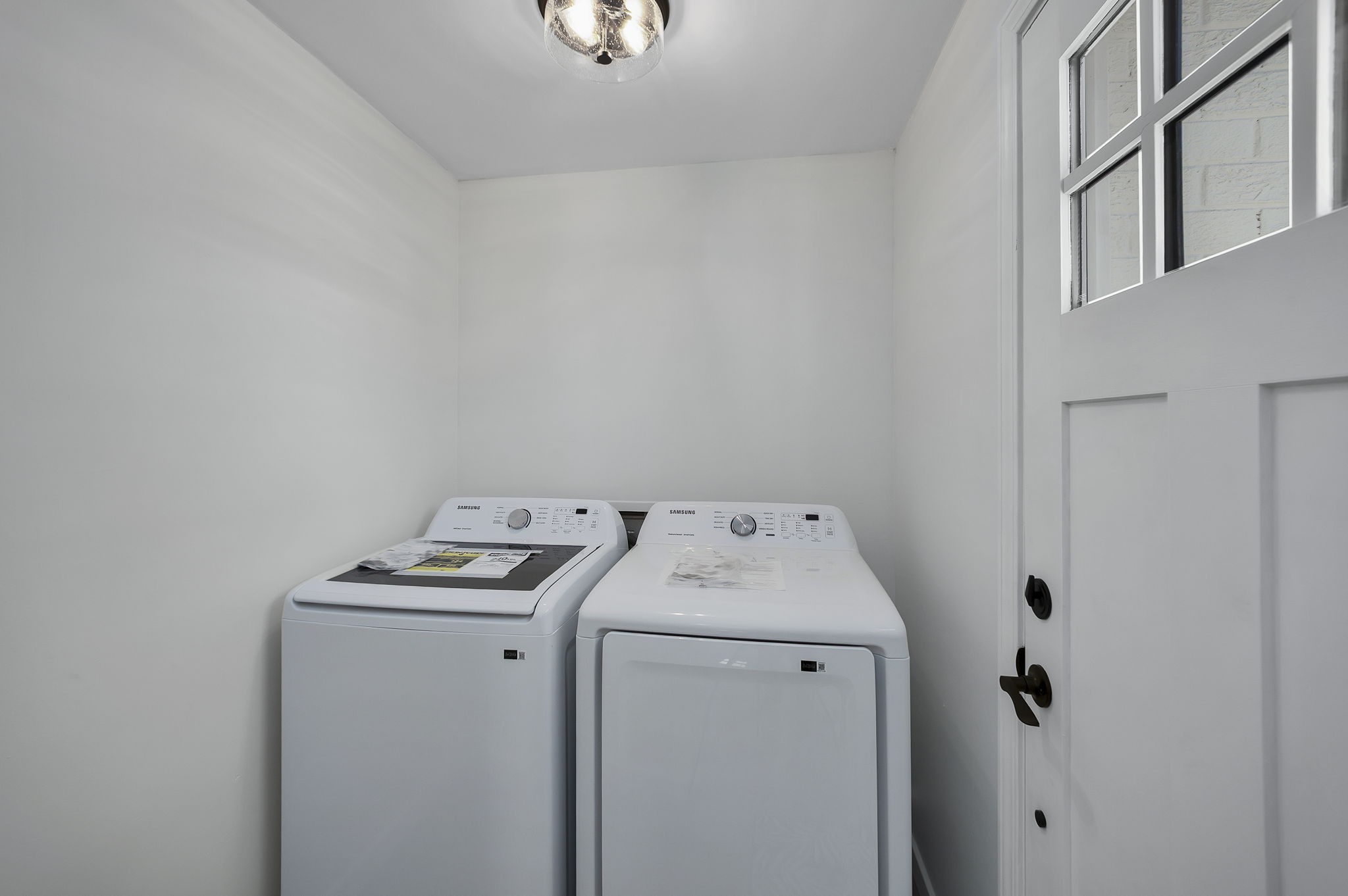 5 Raintree Cove Jackson, TN 38305 - Photo 19 of 25 a utility room with dryer and washer