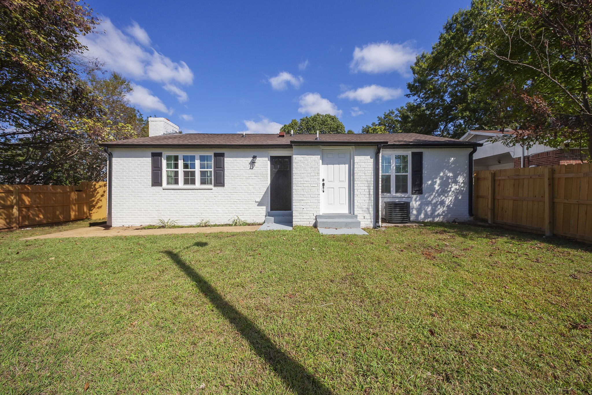5 Raintree Cove Jackson, TN 38305 - Photo 22 of 25 a view of a house with backyard and garden