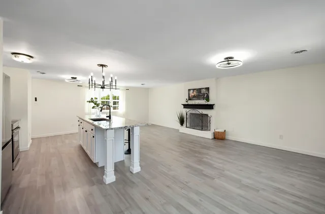 a view of a kitchen and dining room