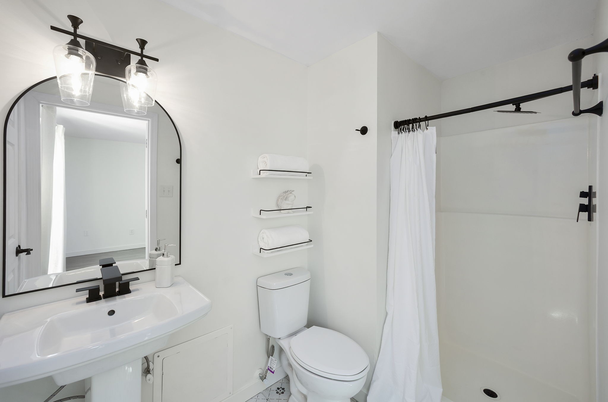 5 Raintree Cove Jackson, TN 38305 - Photo 9 of 25 a bathroom with a sink a toilet and shower