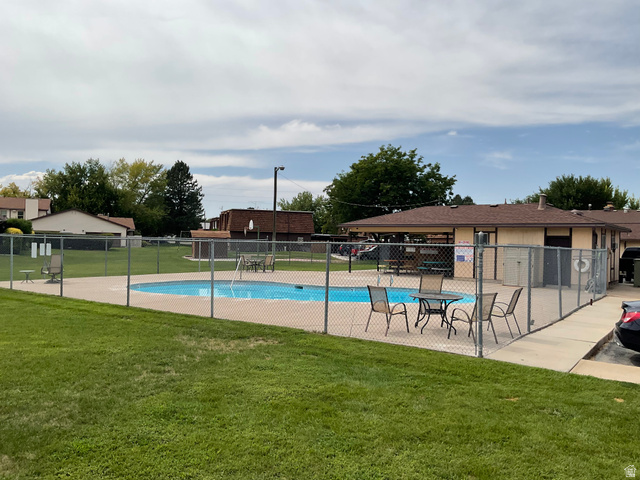621 Coachman Way Riverdale, UT 84405 - Photo 28 of 38 Community pool with a patio area