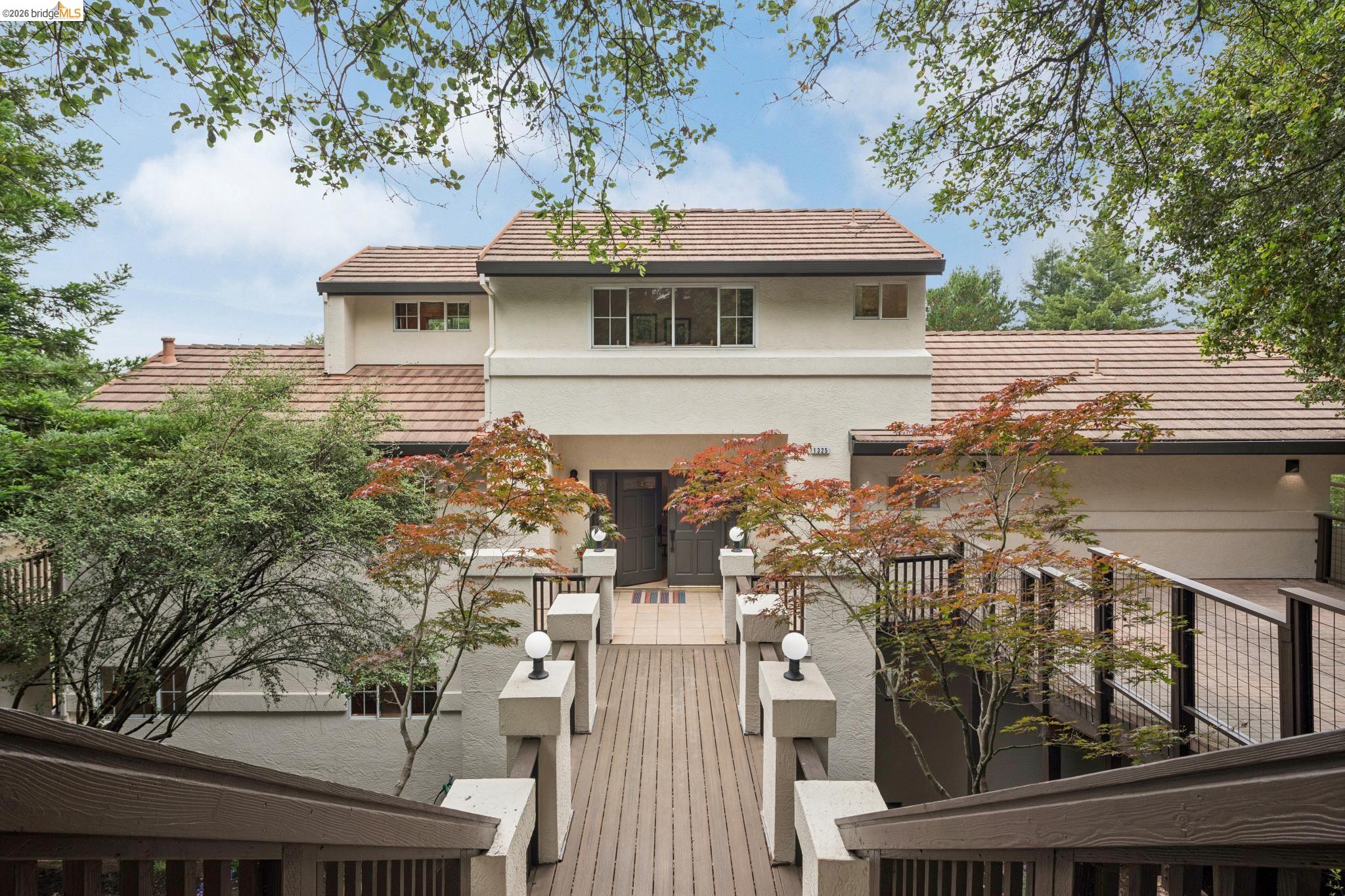 1325 Drury Road Berkeley, CA 94705 - Photo 8 of 71 Contemporary stucco exterior with a multi-level design