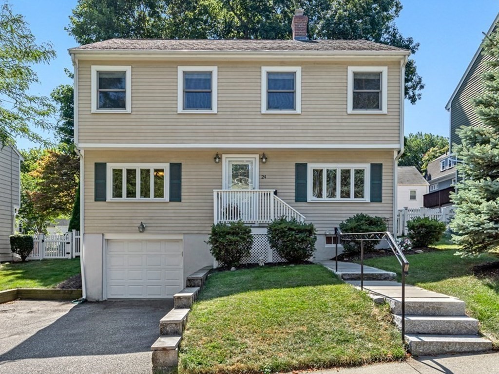 24 Fountain Road Arlington, MA 02476 - Photo 1 of 42 a front view of a house with garden