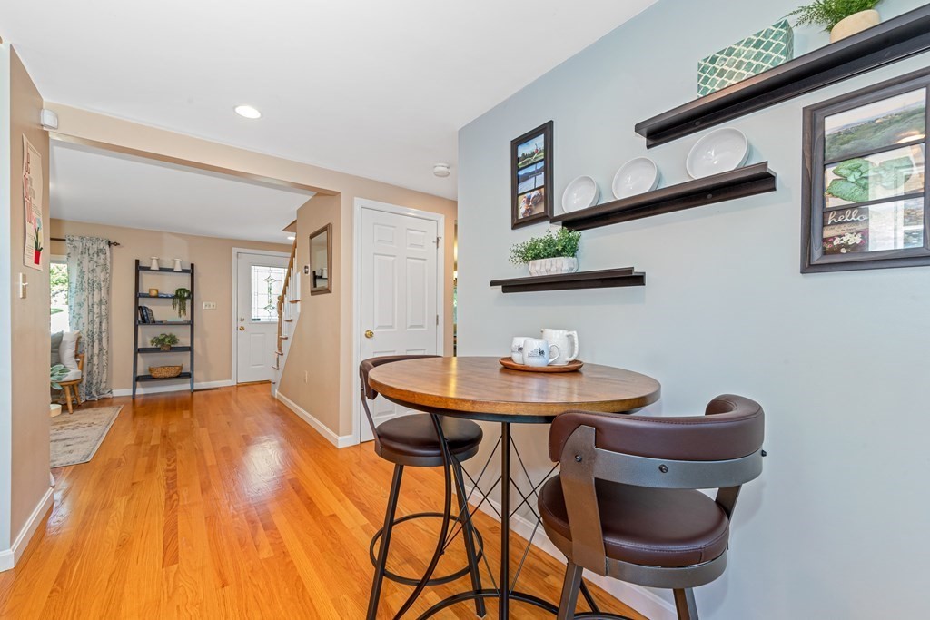 24 Fountain Road Arlington, MA 02476 - Photo 18 of 42 a view of a dining room with furniture and wooden floor