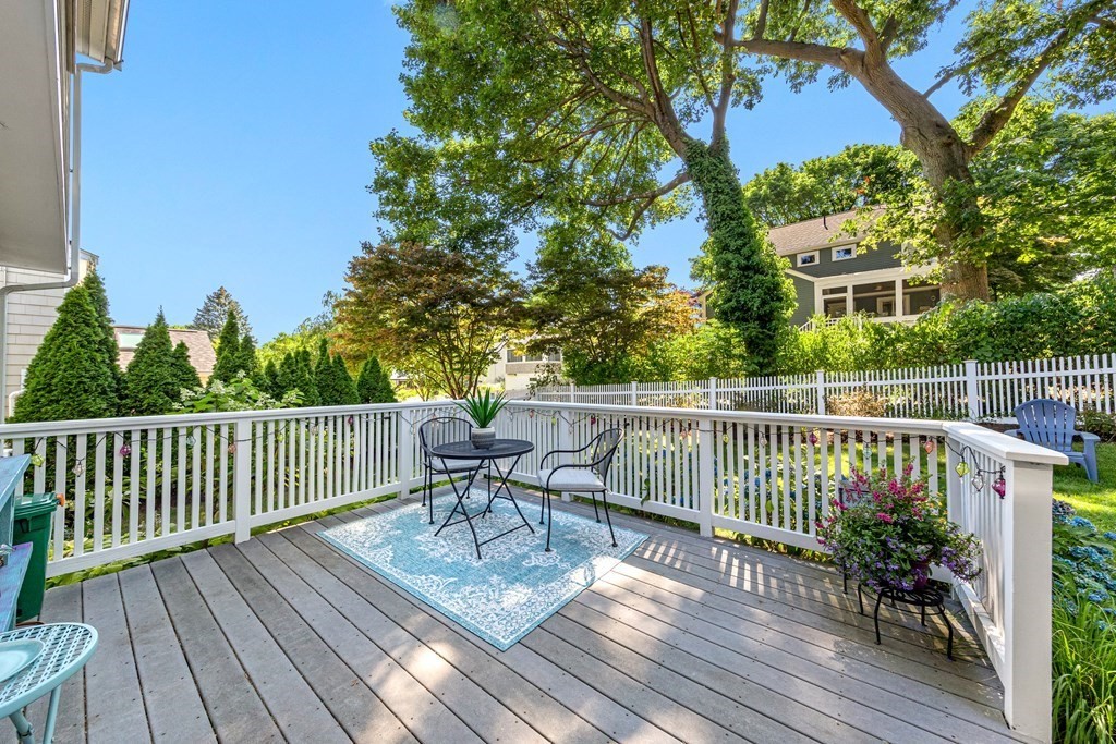 24 Fountain Road Arlington, MA 02476 - Photo 27 of 42 a view of a deck with furniture and wooden floor