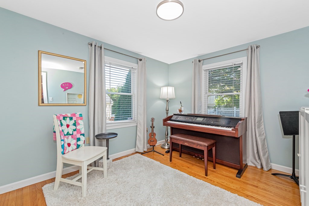 24 Fountain Road Arlington, MA 02476 - Photo 31 of 42 a living room with furniture and a window