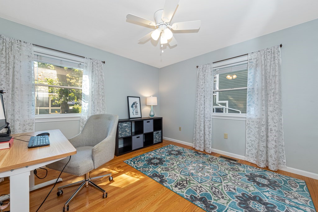24 Fountain Road Arlington, MA 02476 - Photo 33 of 42 a living room with furniture and a window