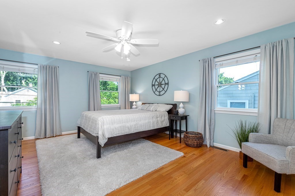 24 Fountain Road Arlington, MA 02476 - Photo 37 of 42 a bedroom with a bed and a table in it