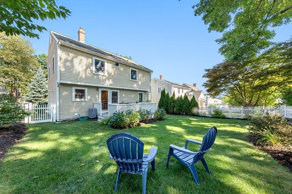 24 Fountain Road Arlington, MA 02476 - Photo 5 of 42 a view of a house with backyard porch and sitting area