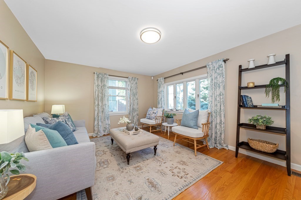 24 Fountain Road Arlington, MA 02476 - Photo 10 of 42 a living room with furniture and a table