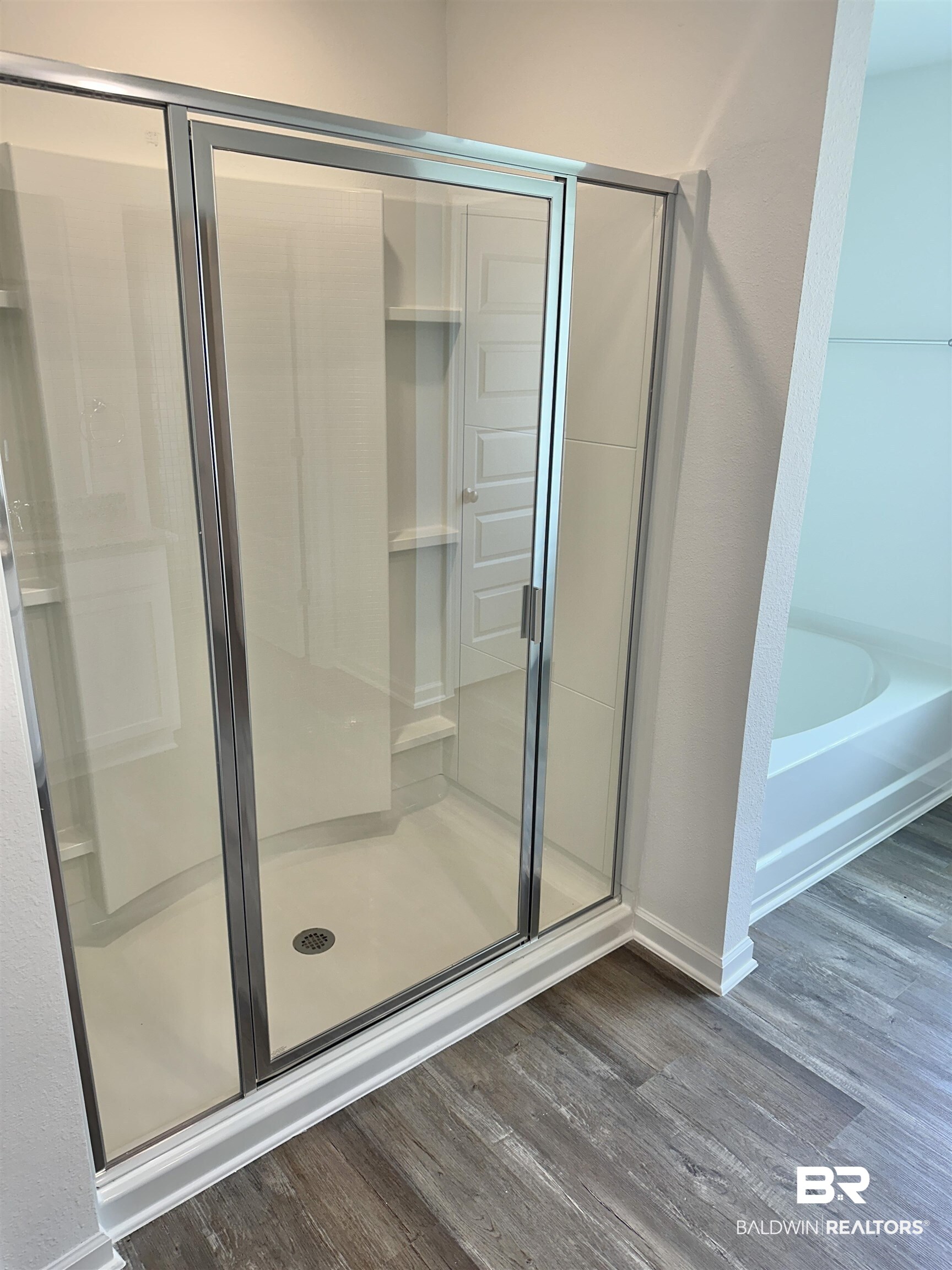 22275 Aleutian Avenue Foley, AL 36535 - Photo 14 of 72 Bathroom featuring wood-type flooring and independent shower and bath