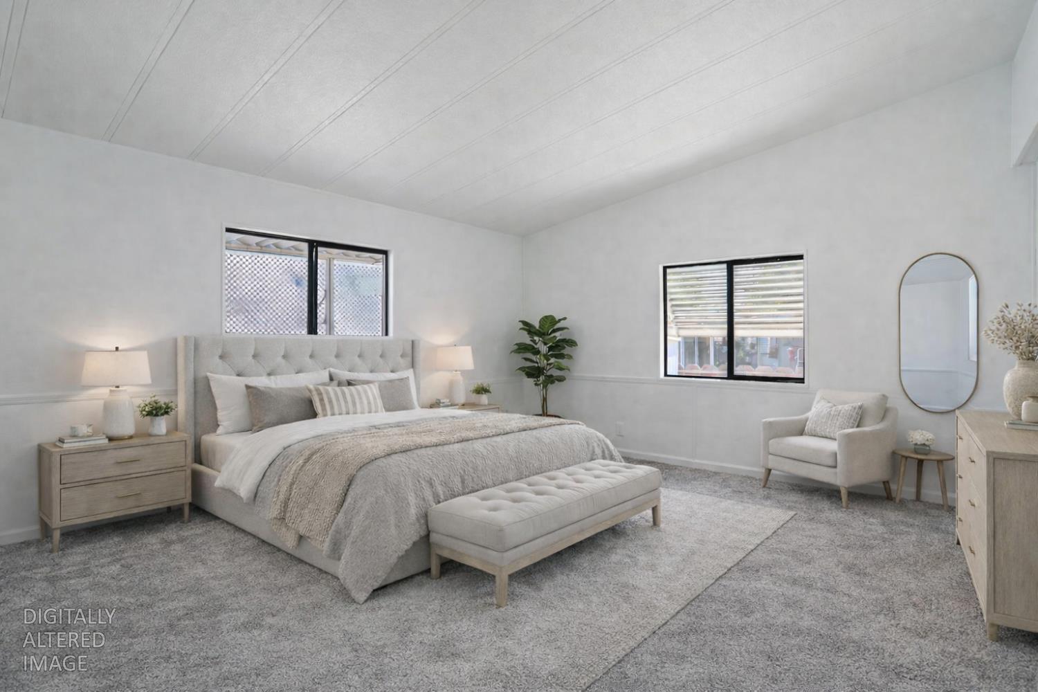 2124 Key W Lane Modesto, CA 95350 - Photo 18 of 30 a spacious bedroom with a bed a chandelier and windows