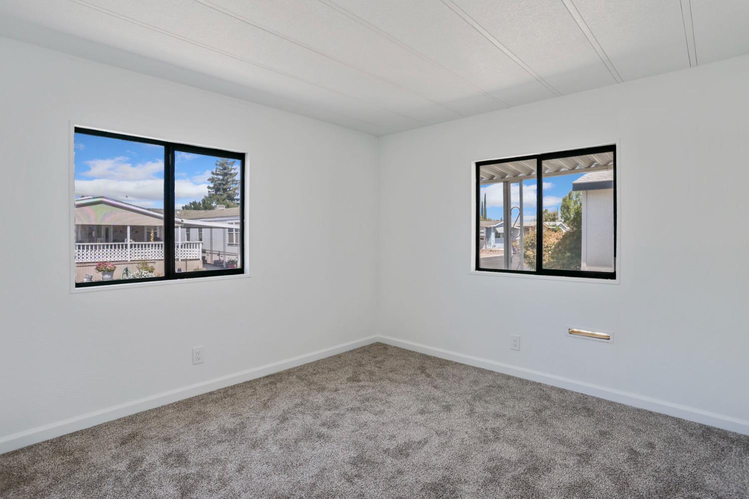 2124 Key W Lane Modesto, CA 95350 - Photo 19 of 30 an empty room with windows