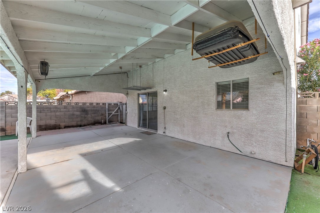 581 Carleton Drive Henderson, NV 89014 - Photo 24 of 37 A spacious covered patio provides a versatile outdoor living area for recreation or relaxation.
