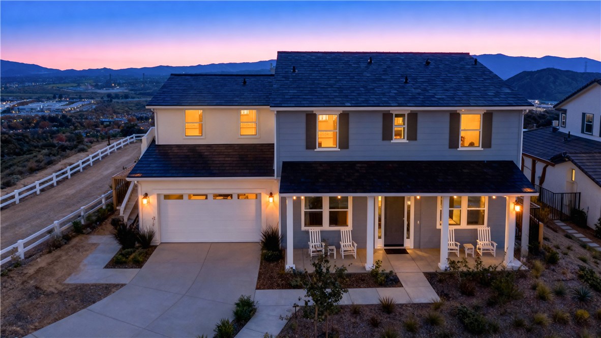 a front view of house with a yard