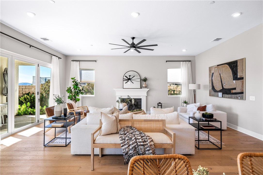 28414 Old Spgs Road Castaic, CA 91384 - Photo 12 of 62 a living room with furniture a rug potted plant and a large window