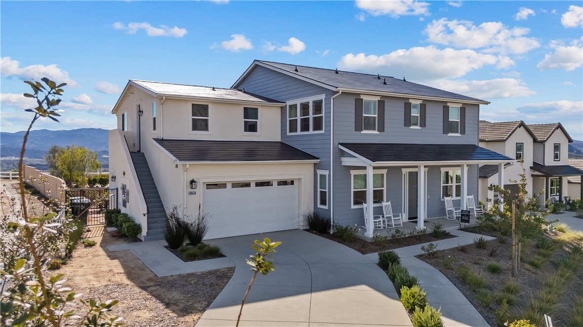28414 Old Spgs Road Castaic, CA 91384 - Photo 39 of 62 a front view of a house with garden