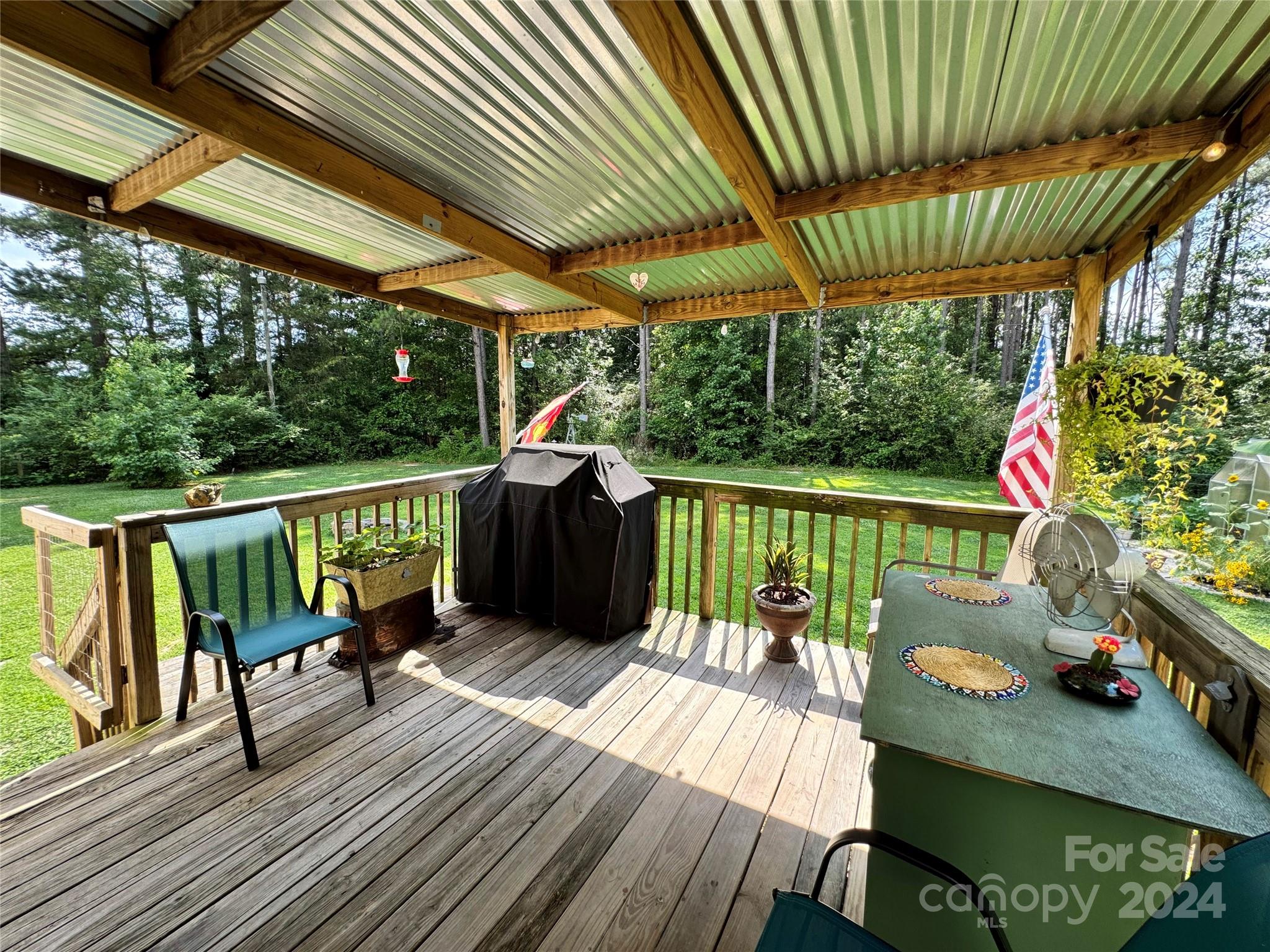 790 Langley Road Lancaster, SC 29720 - Photo 24 of 36 a view of a chairs on the roof deck
