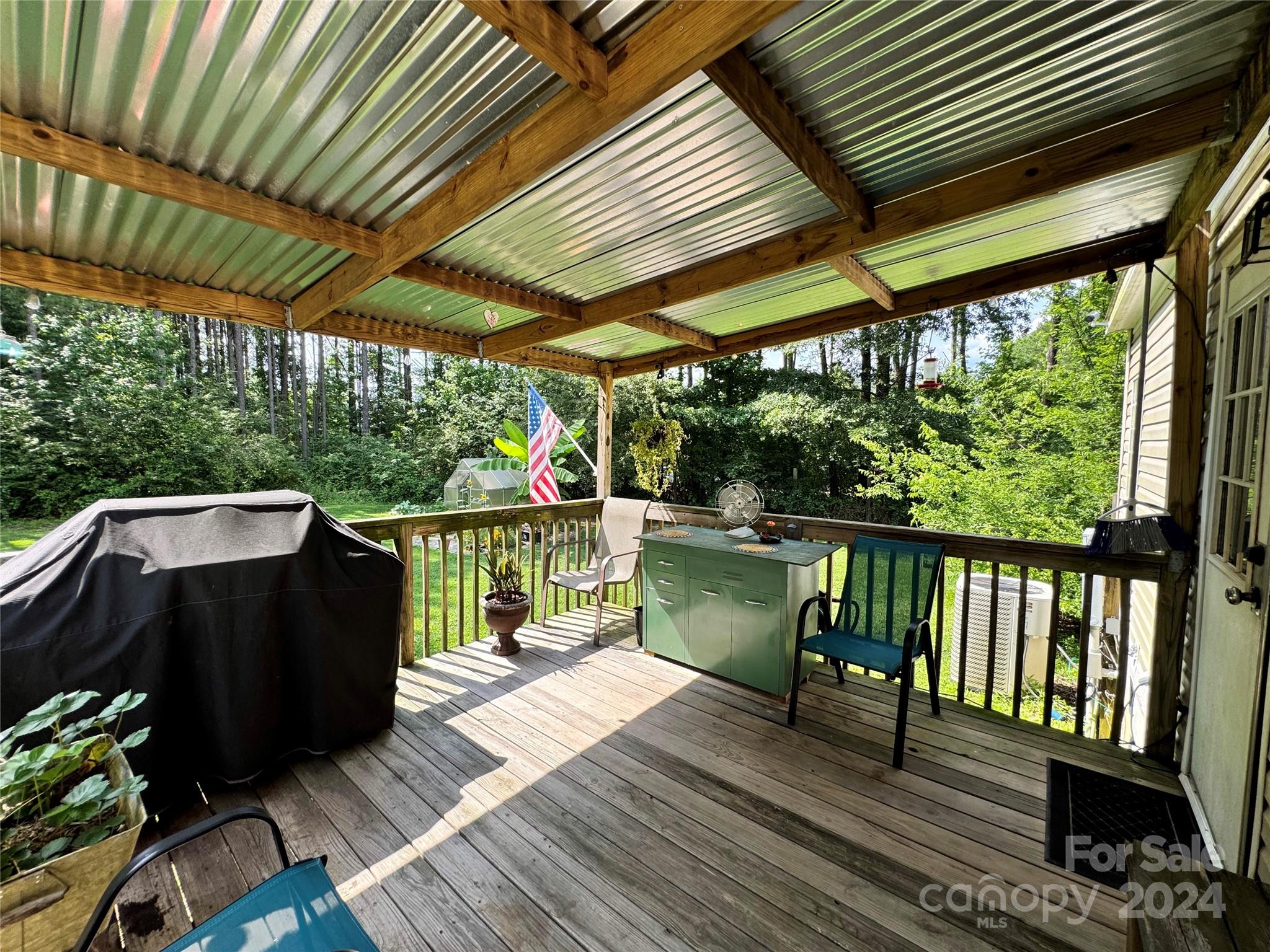 790 Langley Road Lancaster, SC 29720 - Photo 25 of 36 a view of balcony with wooden floor and outdoor seating