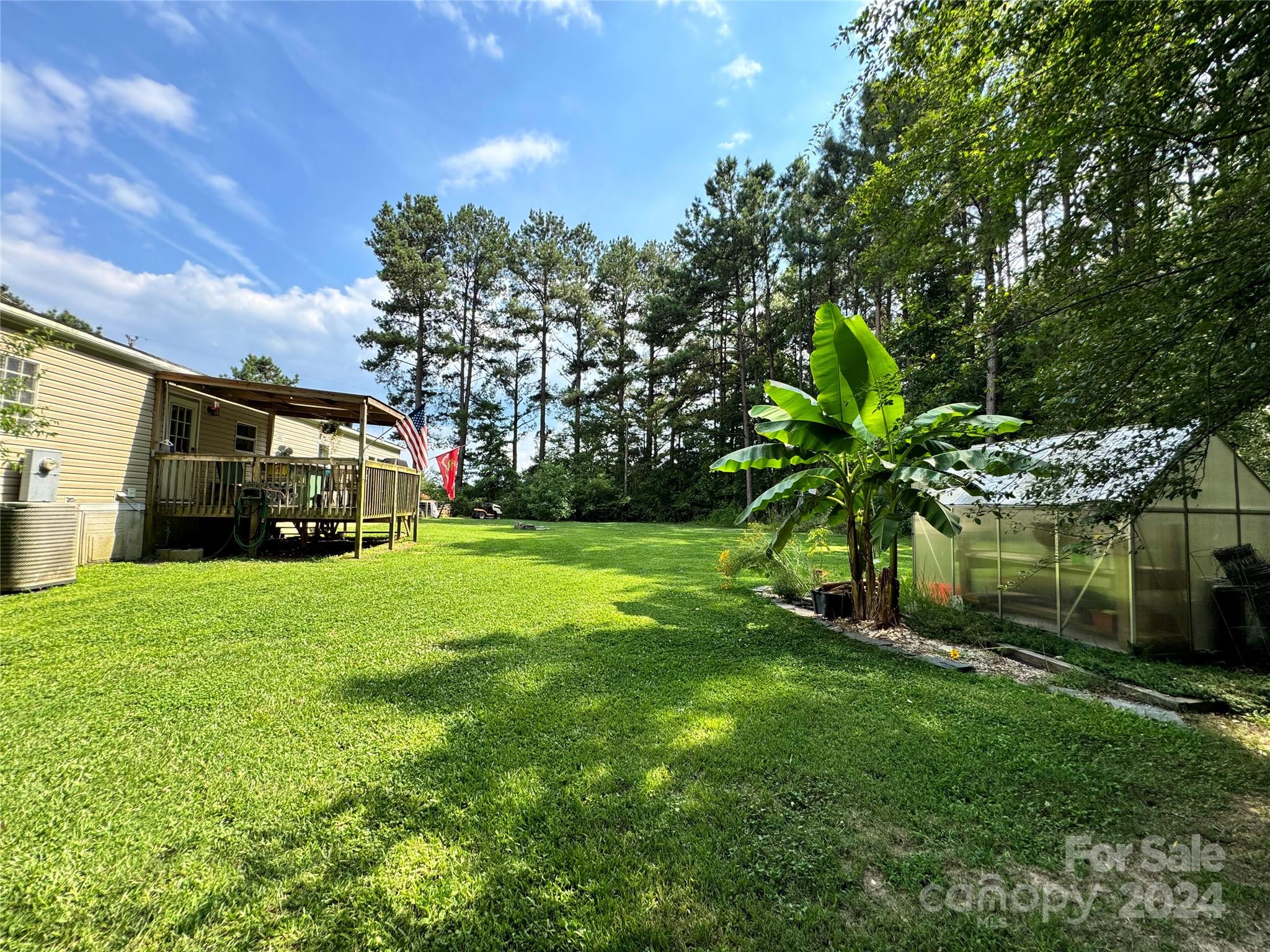 790 Langley Road Lancaster, SC 29720 - Photo 34 of 36 a view of a house with a back yard