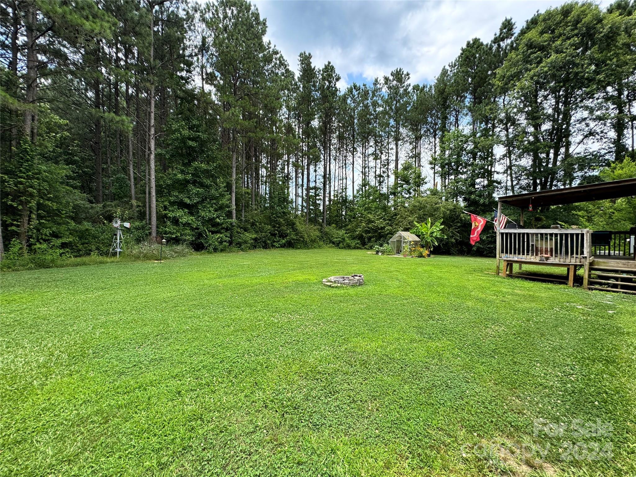 790 Langley Road Lancaster, SC 29720 - Photo 36 of 36 a view of green field with trees in the background