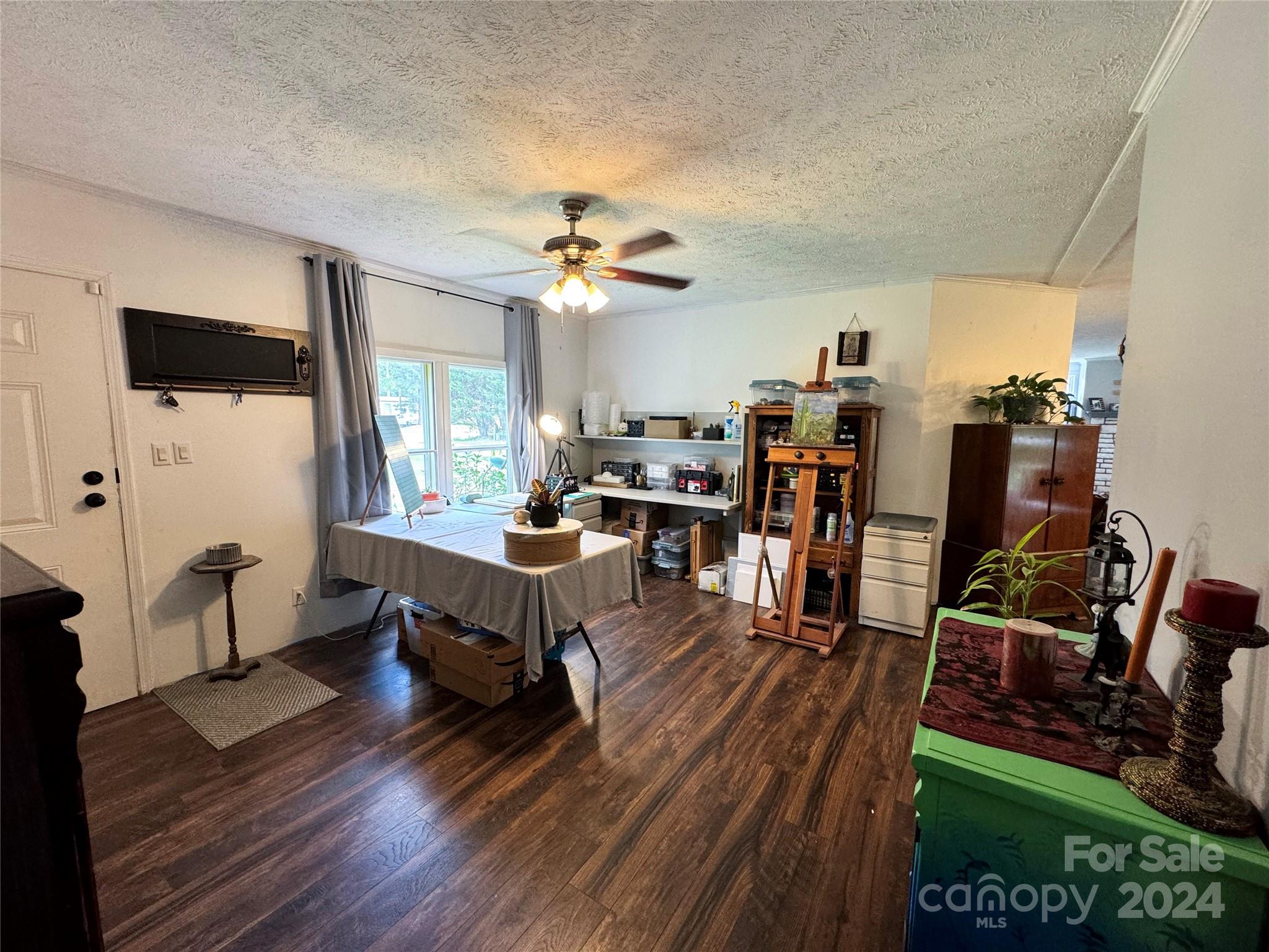 790 Langley Road Lancaster, SC 29720 - Photo 10 of 36 a living room with furniture a ceiling fan and a rug